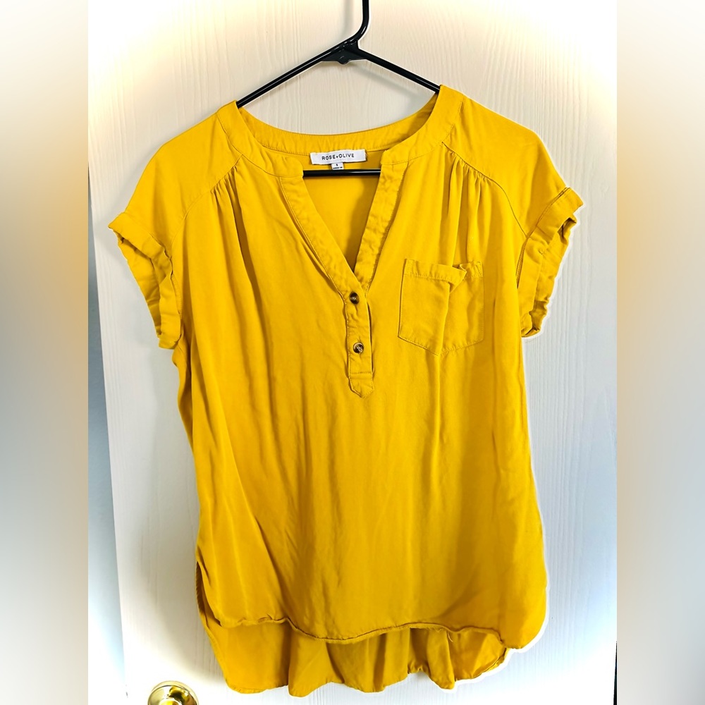 Yellow blouse.